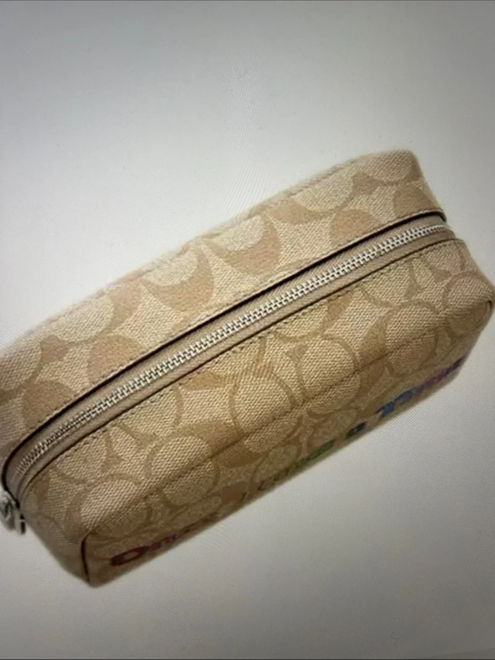 Coach Beige Canvas Pouch with Multicolor 'Once Upon a Time' collectible piece